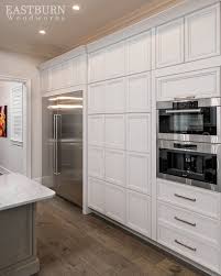 White Painted Kitchen Cabinets With Stainless Steel Appliances Cabinet Doors Are Push To Open Open Kitchen Cabinets Kitchen Cabinets Painting Kitchen Cabinets