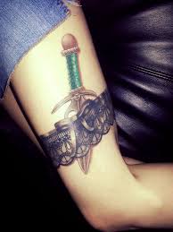 The classic thigh garter is enjoying a revival—in ink, that is! Garter Tattoos On Thigh Designs Ideas And Meaning Tattoos For You