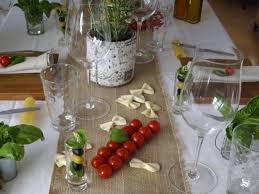 Here's how to make affordable table centerpieces for any dinner theme. Edible Decorations And Dry Noodles For Party Table Decoration Italian Table Decorations Italian Party Decorations Italian Dinner Party Decorations