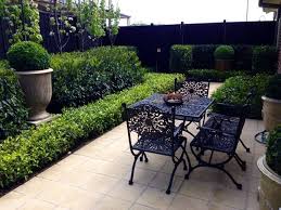 Andrew Stark Garden Design Hedges Are Star Jasmine And The Taller Is Portugal Laurel Garden Design Garden Landscape Design Classic Garden