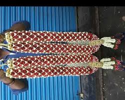 An exchange of garlands between the couple. South Indian Wedding Garland Service Photos Facebook