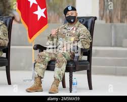 U.S. Army Command Sgt. Maj. John W. Troxell, Senior Enlisted Advisor to the  Chairman of the Joint Chiefs of Staff, greets Brig. Gen. Aaron T. Walter,  Commander of the 100th Training Division,
