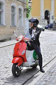 Italian Flair Leather Jacket With Stylish Gloves On Vespa Scooter In Italy Stylish Gloves Leather Gloves Women