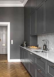 Bold contrast is a major design element for the space, as seen in the combination of both white (not shown) and navy cabinets, says soojian. 27 Moody Dark Kitchen Ideas Dark Kitchen Kitchen Design Kitchen Interior