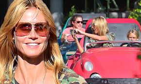 Harper's bazaar is published by hearst and considers itself to be the style resource for women who are the first to buy the best. Heidi Klum S Daughter Leni Takes The Wheel Of A Car Ride As The Family Visits Disneyland Daily Mail Online