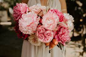 This flower is perfect for fleshing out a classic wedding bouquet or arrangement. 20 Pretty Pink Wedding Bouquets For Every Style Bride