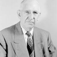 Robert Serber, Laboratory theorist, writing for a photographer shortly  after the announcement of the discovery of machine-made mesons by Gardner  and Lattes in February 1948. Morgue 1948-3 (P-1) [Photographer: Donald  Cooksey] -
