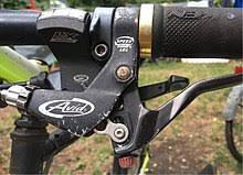 You don't need to remove it completely. Bicycle Brake Wikipedia