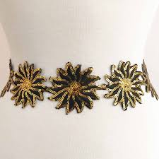 Wild spring leaf wildflower isolated. Black And Gold Sequin Embroidered Flower Trim Shine Trim