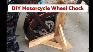 The bike will stand on its own in the chock; Homemade Motorcycle Wheel Chock 5 Amazing Ideas