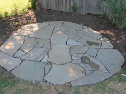Bluestone patio with rustic fixed fire pit. Learn About Installing Finishing Touches For A Flagstone Patio Diy Network Blog Made Remade Diy