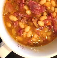 Slow Cooker Ham And Navy Bean Soup Add those into the crock pot along with the meat and prepared beans, plus chicken stock.