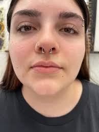 BIG LEFTYS BODY PIERCINGS AND TATOOS. 619-585-8122 for info