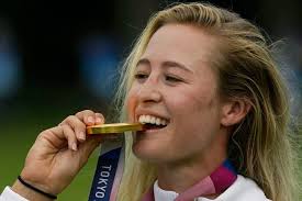 American golfer nelly korda bites her gold medal after winning the olympic tournament on saturday (late friday night pt) at the. Deu6ouf2v Bvem