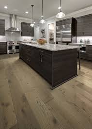 Grey hardwood flooring brings a touch of modern elegance to your living room, kitchen, bedroom, or any space that needs a lift. Graceful Grey Hardwood Flooring Hearthwood Floors