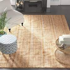 For a substantial space, it's best to purchase a large area rug so all your furniture can sit on top of it. Latham Rigo Jute Hand Woven Tan Area Rug Teppichboden Teppich Teppich Gunstig