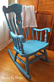 A rocking chair or glider chair is a nursery staple. Nursery Rocking Chair Makeover Spray Paint It For Less Than 10