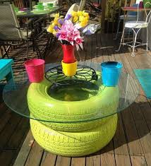 This stunningly unique wooden coffee table is a perfect example of how one person's trash can absolutely be another's treasure! 9 New Uses For Tires New Ways To Use Old Tires