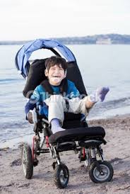Happy Disabled Five Year Old Boy In Wheelchair On The Beach Disability Disability Awareness Special Needs Kids