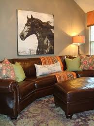Grey Wall Brown Sofa Punches Of Orange And Green Juxtapost Com Brown Leather Couch Brown Living Room Decor Brown Leather Sofa