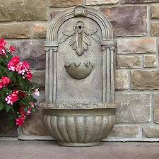Ces fontaines en pierre taillée sont inspirées des anciennes fontaines. Installer Une Fontaine Murale De Jardin Conseils Video Photos