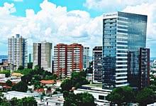 The two rivers flow side by side for many miles, different in color, mixing in eddies: Manaus Wikipedia