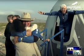 He was accompanied by mark bezos, his brother, wally funk, an. V 3mzozbo6b11m