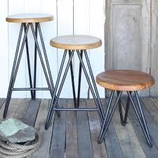 Homart S Harpoon Bar Stool Employs Hairpin Legs To Create A Perfect Mid Century Base With An Updated Style S Iron Stools Iron Bar Stools Modern Counter Stools