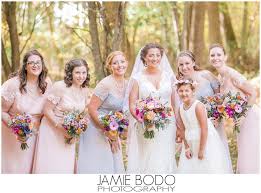 Gorgeous Rustic Wedding With Colorful Wild Flower Bouquets Blush And Lilac Bridesmaids Dresses App Farm Wedding Photos Farm Wedding Lilac Bridesmaid Dresses