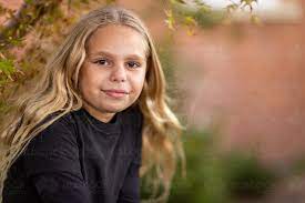 We may earn commission from the links on this page. Image Of Young Aboriginal Girl With Brown Eyes And Long Blonde Hair Austockphoto