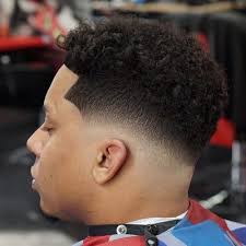 Guys with curly, wavy, or otherwise kind of fluffy hair can also ask for a low fade haircut to keep things neat on the sides. 20 Curly Hair Fade Haircuts For Sexy Guys In 2021