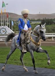 Turkmenistan S President Gurbanguli Berdymukhamedov In A Traditional Turkmen Costume Astride An Akhal Teke Atlar