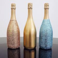 Go For The Gold With These Diy Sparkly Bottles Evite Glitter Wine Bottles Glitter Champagne Bottles Bottle Crafts