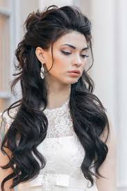 It's a formal look that would work great for prom, especially with the addition of a jeweled headpiece. Prom Hairdos For Long Dark Hair Hair Styles Long Hair Styles Half Updo Hairstyles