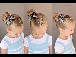 A cute style that is very simple to put together. Connected Twists Into A Top Knot Q S Hairdos Youtube Kids Hairstyles Twist Hairstyle Kids Kids Hairstyles Girls