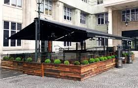 Butterfly Awning With Branded Valances Heaters And Planters See More At Www Breezefree Co Outdoor Restaurant Design Restaurant Patio Outdoor Restaurant Patio
