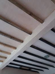Black beams with a wood ceiling will camouflage any imperfections on your ceiling while accentuating the intricate architectural designs. Remove Paint From Exposed Ceiling Beam Diynot Forums