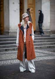 Cloudy Zakrocki Is Seen Wearing Sleeveless Coat Burberry Bucket Hat Sleeveless Coat Outfits With Hats Burberry Bucket Hat