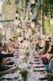 Rustic Outdoor Reception With Hanging Lights Diy Wedding Lighting Wedding Lights Lights Wedding Decor