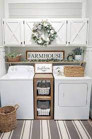 This laundry room features a vintage hotel sign and glass canisters for detergent and other essentials. Admit It Farmhouse Laundry Room Is Usually The Most Messiest Room At Your Home B Dream Laundry Room Laundry Room Renovation Laundry Room Organization Storage