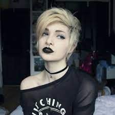 The sides are shaved short with a clear line of demarcation, and the hair on the top is styled in a semi pompadour design. 50 Progressive Short Punk Hairstyles My New Hairstyles
