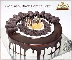 Birthday Cake Ribbons And Balloons Cake Images Ribbons And Balloons German Black Forest Is A Dense Rich Chocolate Cake With Mouthwatering Layers Of Cream All In All Cake Rich Chocolate Cake Chocolate Cake