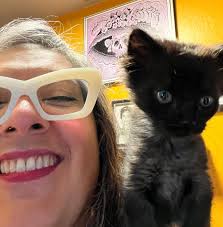 Pup models hats at Camas Days