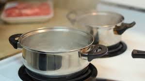 Place the pot on the stove and turn the burner underneath it to high. Pot Full Of Boiling Water Stock Footage Video 100 Royalty Free 2955988 Shutterstock