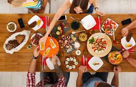 Hosts should never ask women to take heels off and should allow smoke breaks. People Eat Healthy Meals At Festive Table Dinner Party Family Meal Planning Healthy People Eating Festive Tables