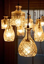 I Think Lead Crystal Decanters Are Not Safe For Storing Beverages But Are Excellent Repurposed Into Lights Diy Pendant Light Diy Light Fixtures Decanter Lights