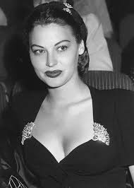 WHISTLE STOP (1946)** Stunningly beautiful, sultry Ava Gardner (1922-1990)  was one of Hollywood's most gorgeous love goddesses (and, in fact, played  one in 1948's ONE TOUCH OF VENUS). With dark hair, green