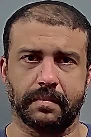 Report: Pensacola man took photos of another man over bathroom stall