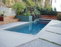 20 Gorgeous Planters By The Swimming Pool Home Design Lover Concrete Swimming Pool Pool Landscape Design Swimming Pools