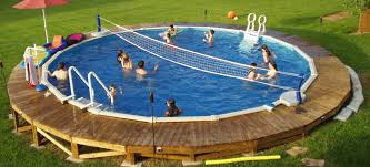 Try creating a cement patio around parts of the pool. Above Ground Pool Buster Crabbe Pool Springfield Mo